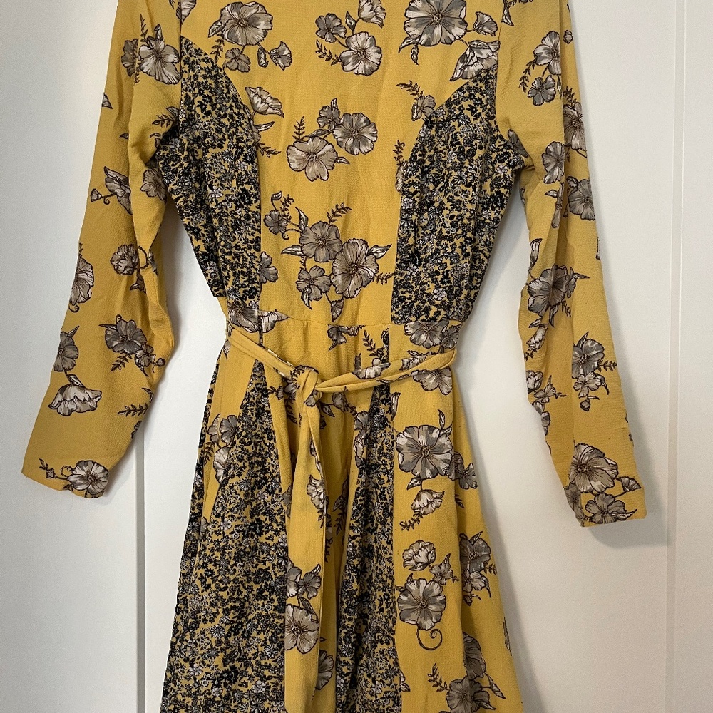 Yellow long-sleeved dress with gray and white floral pattern